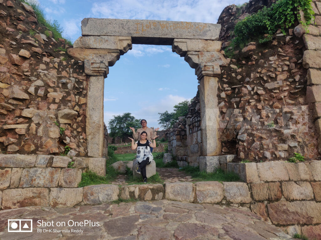 Author Dr K Sharmila Reddy with her friend at the Trabeate arched entrance