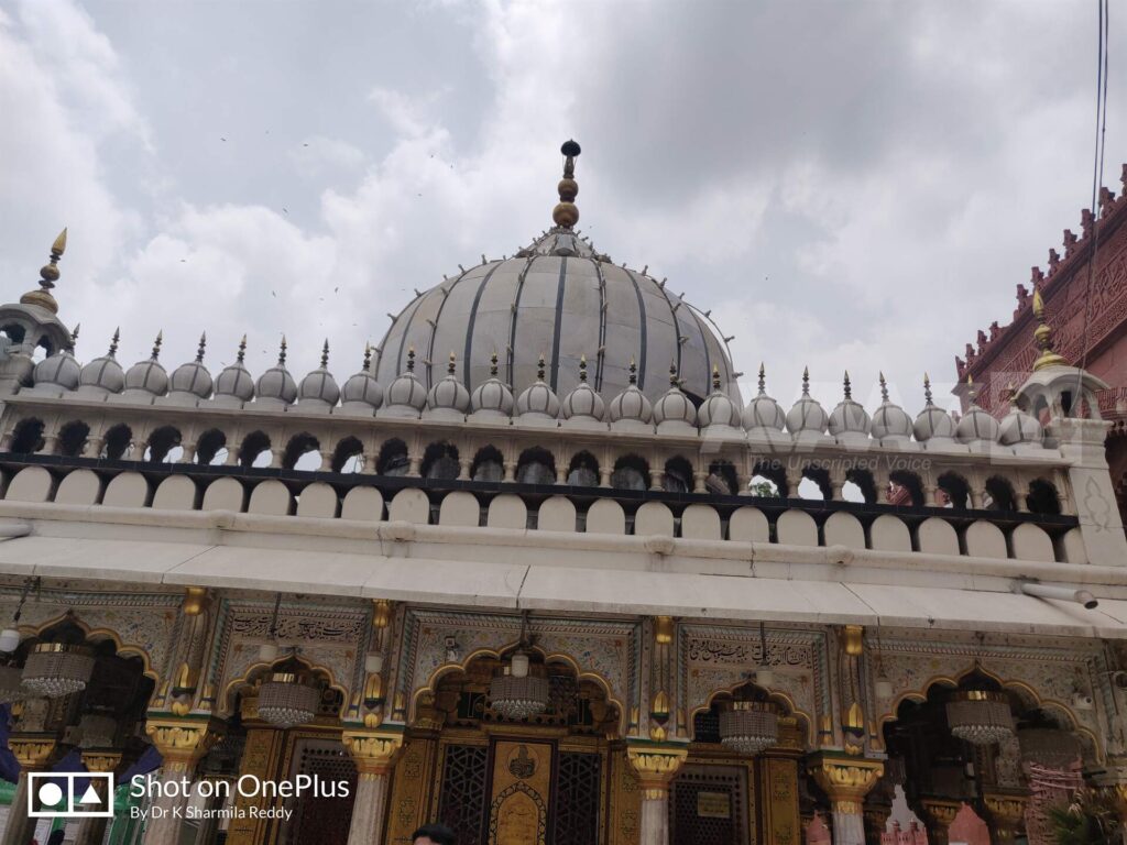 Dome of the tomb- parapet wall of solid domes- dwarf marble chattris at the corners