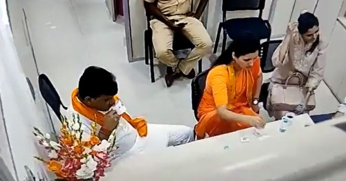 navneet kaur with her husband in a police station